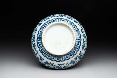 A Chinese blue and white 'lotus scroll' bottle vase, 18/19th C.