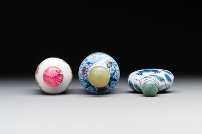 Two Chinese blue, white and copper-red snuff bottles and a blue and white 'crab' snuff bottle, Chenghua and Qianlong mark, 19th C.