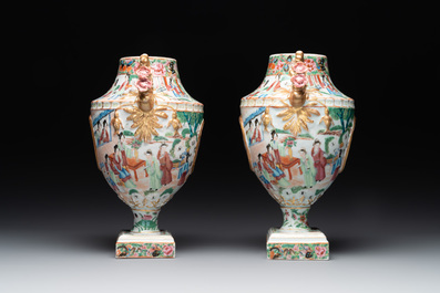 A rare pair of Chinese Canton famille rose export urns, 19th C.