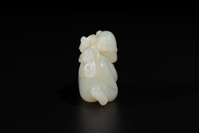 A Chinese white jade sculpture of a boy and a double gourd, Qing