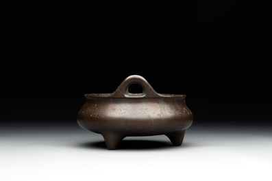 A Chinese bronze tripod censer, Guan Huai Tang Zhu Ren 冠槐堂主人 mark, 17/18th C.