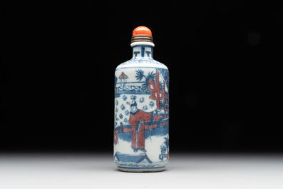 A Chinese blue, white and copper-red snuff bottle, Kangxi mark, 19th C.