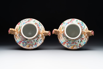 A rare pair of Chinese Canton famille rose export urns, 19th C.