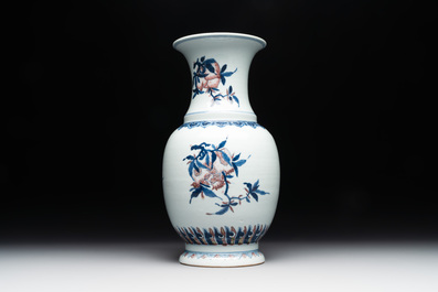 A Chinese blue, white and copper-red 'Three abundances' or 'Sanduo' vase, 19/20th C.