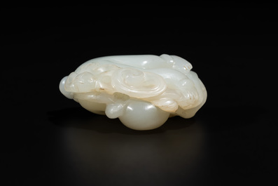 A Chinese white jade sculpture of a boy and a double gourd, Qing
