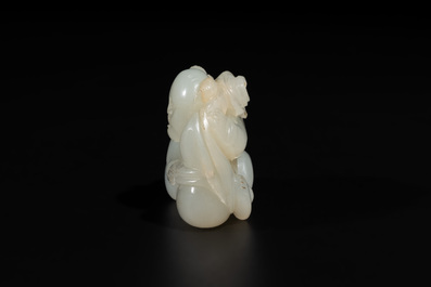 A Chinese white jade sculpture of a boy and a double gourd, Qing