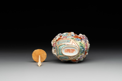 A Chinese famille rose moulded snuff bottle, Qianlong mark, late 18th/early 19th C.