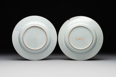 A pair of Chinese famille rose black-ground 'flowers and scrolls' plates, Yongzheng/Qianlong