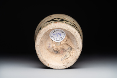 An early Islamic pottery albarello with engraved copper mount and cover, probably Nishapur, Iran, 10/11th C.