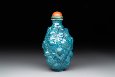 A rare Chinese robin's-egg-glazed moulded '18 Luohan' snuff bottle, 19th C.