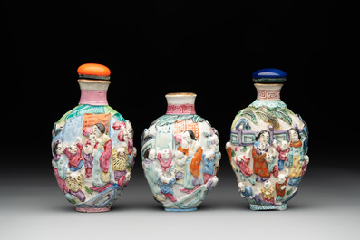 Six Chinese moulded famille rose snuff bottles, Qianlong mark, 19th C.