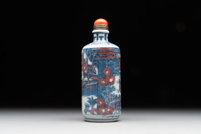 A Chinese blue, white and copper-red snuff bottle, Kangxi mark, 19th C.