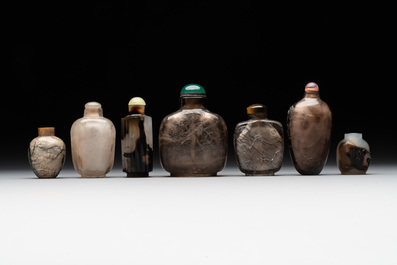 Seven Chinese smoky quartz, agate and hardstone snuff bottles, 19/20th C.
