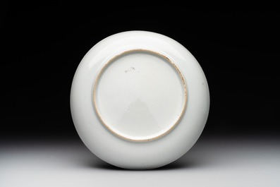 A Chinese famille rose 'erotic subject' cup and saucer, Yongzheng/Qianlong