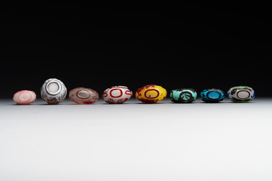Eight Chinese Peking glass snuff bottles, Qianlong mark, 19/20th C.
