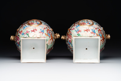 A rare pair of Chinese Canton famille rose export urns, 19th C.