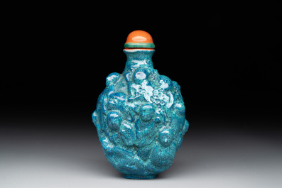 A rare Chinese robin's-egg-glazed moulded '18 Luohan' snuff bottle, 19th C.