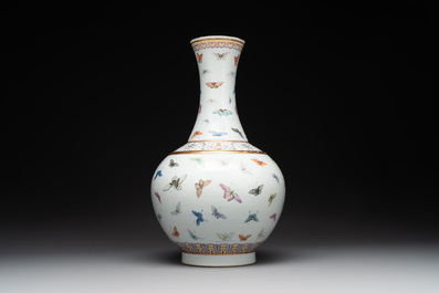 A Chinese famille rose 'butterfly' bottle vase, Guangxu mark and of the period