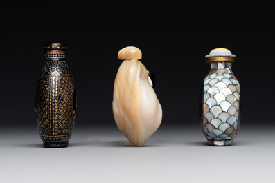 Two Chinese lacquered and mother-of-pearl-inlaid snuff bottles and a carved mother-of-pearl shell snuff bottle, Qianlong mark, 18/19th C