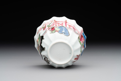 A Chinese famille rose cup and saucer with a reclined lady, Qianlong