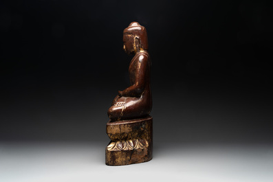 A Burmese lacquered and gilt wooden Buddha, 17/18th C.
