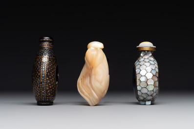 Two Chinese lacquered and mother-of-pearl-inlaid snuff bottles and a carved mother-of-pearl shell snuff bottle, Qianlong mark, 18/19th C