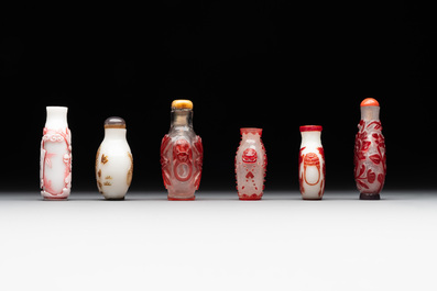 A group of six Chinese overlay glass snuff bottles, 19th C.