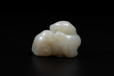 A Chinese white jade carving of a reclining camel, Qing