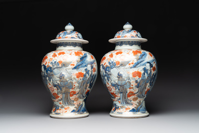 A pair of fine Chinese Imari-style vases and covers with narrative design, Kangxi