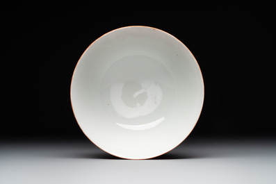 A Chinese coral-red-glazed bowl with reverse-decorated bamboo design, Xuantong mark and of the period