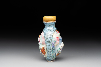 A Chinese moulded famille rose 'playing boys' snuff bottle, Qianlong mark, 19th C.