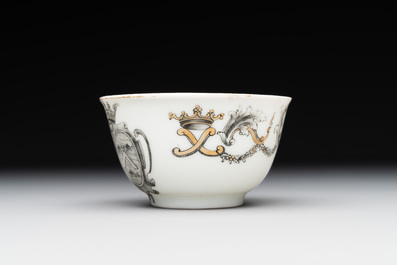 A Chinese gilt-decorated grisaille armorial cup and saucer, Qianlong