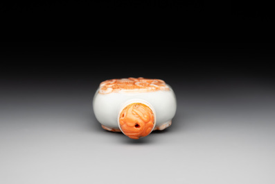 A Chinese moulded iron-red 'chilong' snuff bottle, 19th C.