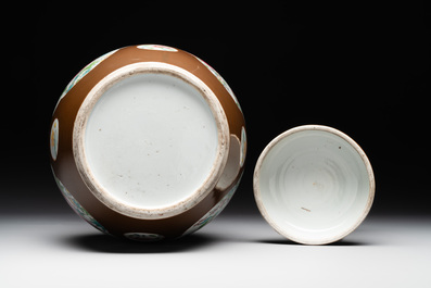 A pair of Chinese capucin-brown-ground famille rose covered jars with floral design, Yongzheng/Qianlong