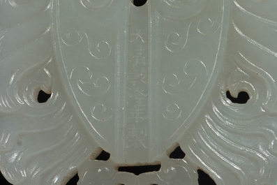 A Chinese white jade 'double phoenix' plaque, Qianlong mark and possibly of the period