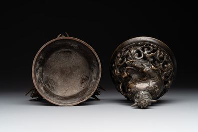 A fine Chinese tripod 'elephant' censer and cover, Ming