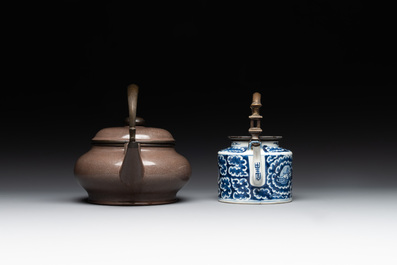 A Chinese polished purple Yixing stoneware covered teapot for the Thai market and a blue and white covered teapot, 19th C.