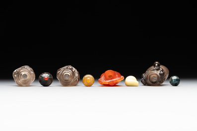 Eight Chinese jade, glass, agate and smoky quartz snuff bottles, 19/20th C.