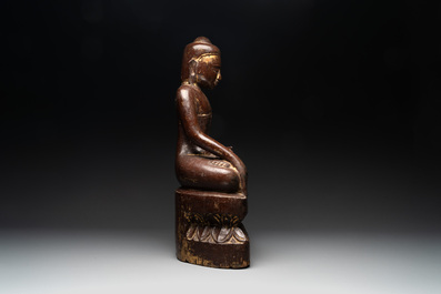A Burmese lacquered and gilt wooden Buddha, 17/18th C.