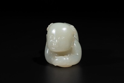 A Chinese white jade carving of a reclining boy, Qing