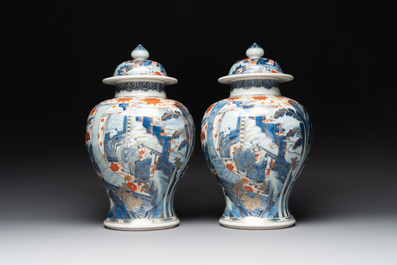 A pair of fine Chinese Imari-style vases and covers with narrative design, Kangxi