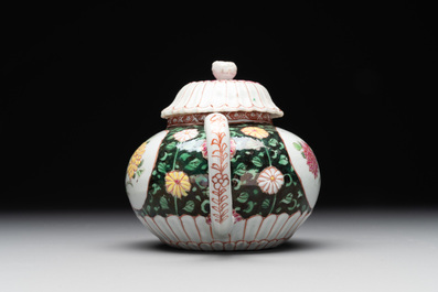 A Chinese famille rose black-ground teapot with cover and stand and a sauce boat, Qianlong
