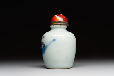 A Chinese blue, white and copper-red snuff bottle, 19th C.