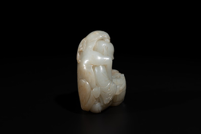 A Chinese white and russet jade 'Lu Ru Feng Qin 鹿乳奉親' carving, Qing
