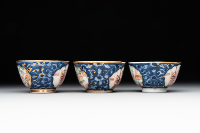 A Chinese Canton famille rose 18-piece 'mandarin subject' tea service, Qianlong