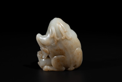A Chinese white and russet jade 'Lu Ru Feng Qin 鹿乳奉親' carving, Qing