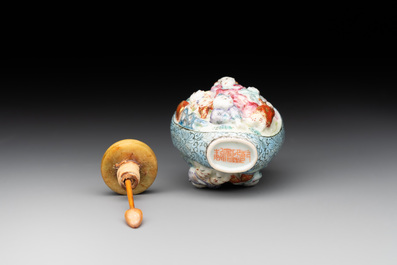 A Chinese moulded famille rose 'playing boys' snuff bottle, Qianlong mark, 19th C.