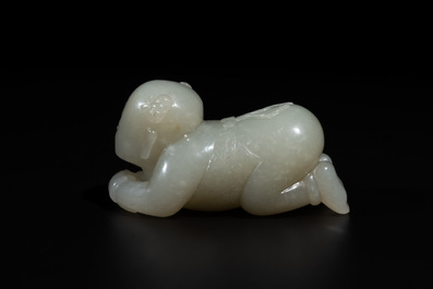 A Chinese white jade carving of a reclining boy, Qing