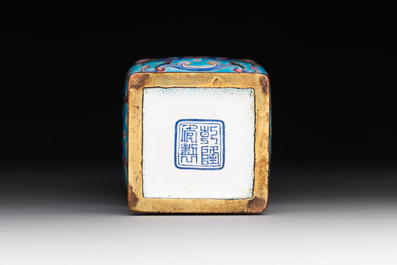 A Chinese Canton enamel 'gu' vase with floral design, Qianlong mark and of the period