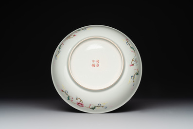 A Chinese yellow-ground famille rose 'magpie and plum tree' plate, Tongzhi mark and of the period